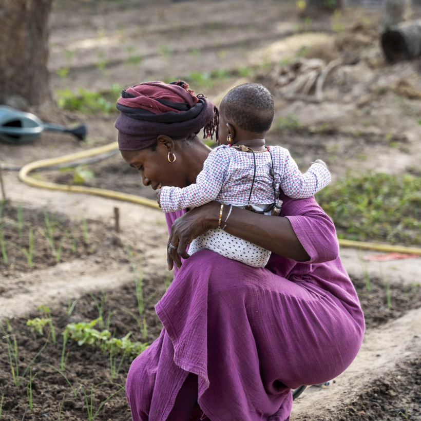 EGALES beneficiary working the field in Casamance, Senegal